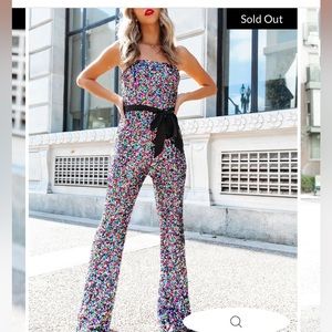 Sequin Bejeweled Romper. Belt not included.